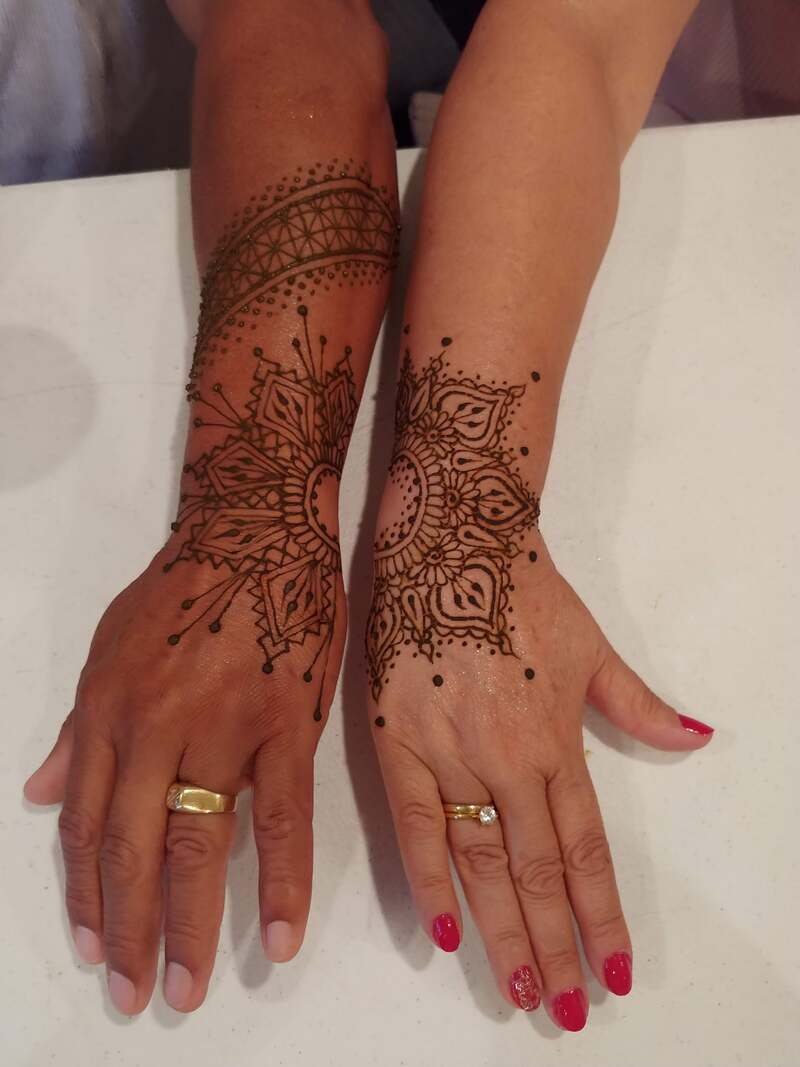women and mens matching boho henna hands
