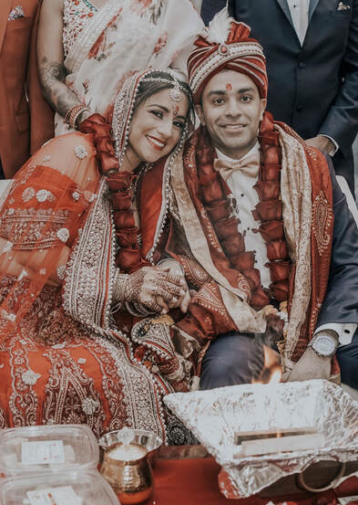 Couple at indian wedding with henna