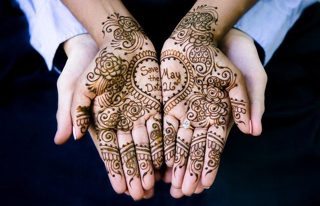 save the date henna design on palms 