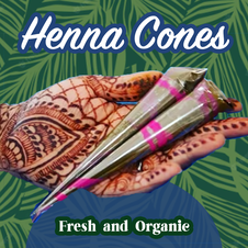 organic henna cones in hand with dark stain