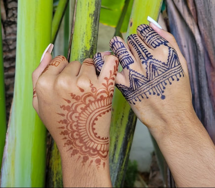 pinky promise hands with henna and jagua designs