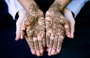 Engagement photos with bridal henna as announcement 